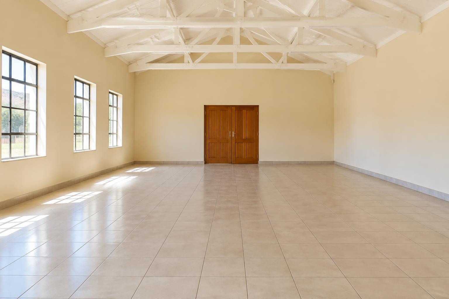 Illustrative empty event hall before styling